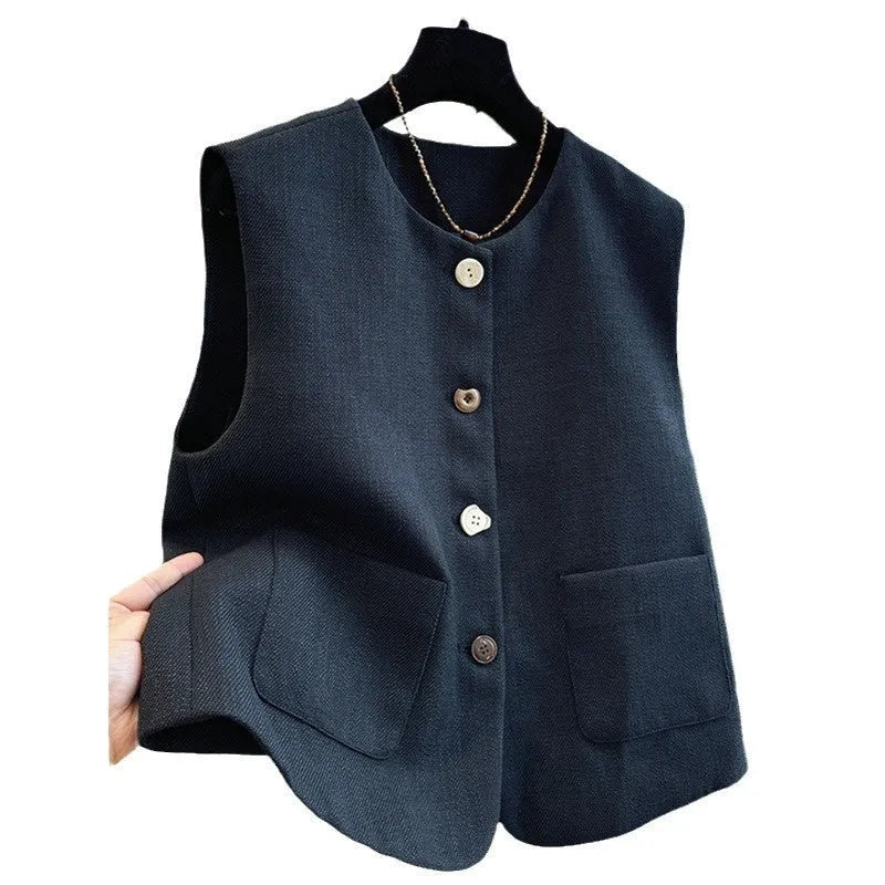 Women's French-style sleeveless bandage vest dress in black, shown on a model, round neck design.