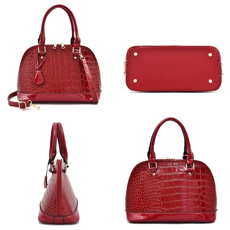 Large shell-shaped shoulder crossbody bag in shiny PU leather with structured silhouette
