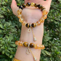 Handmade unisex crystal bracelet with topaz beads and diamond-encrusted gourd centrepiece, 10mm size options