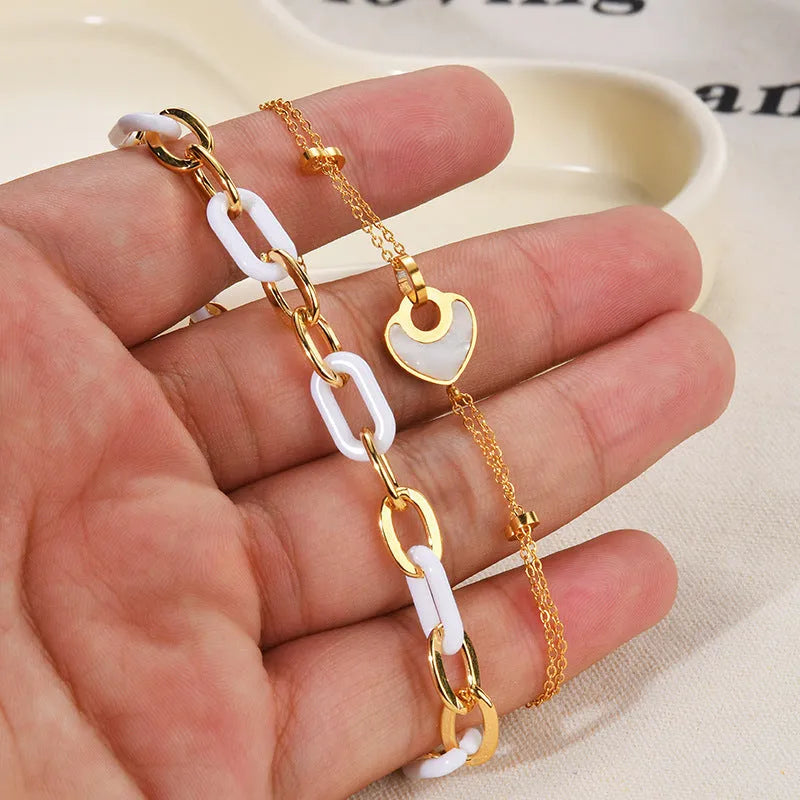Women's stainless steel resin bracelet with double-layered heart design and electroplating finish