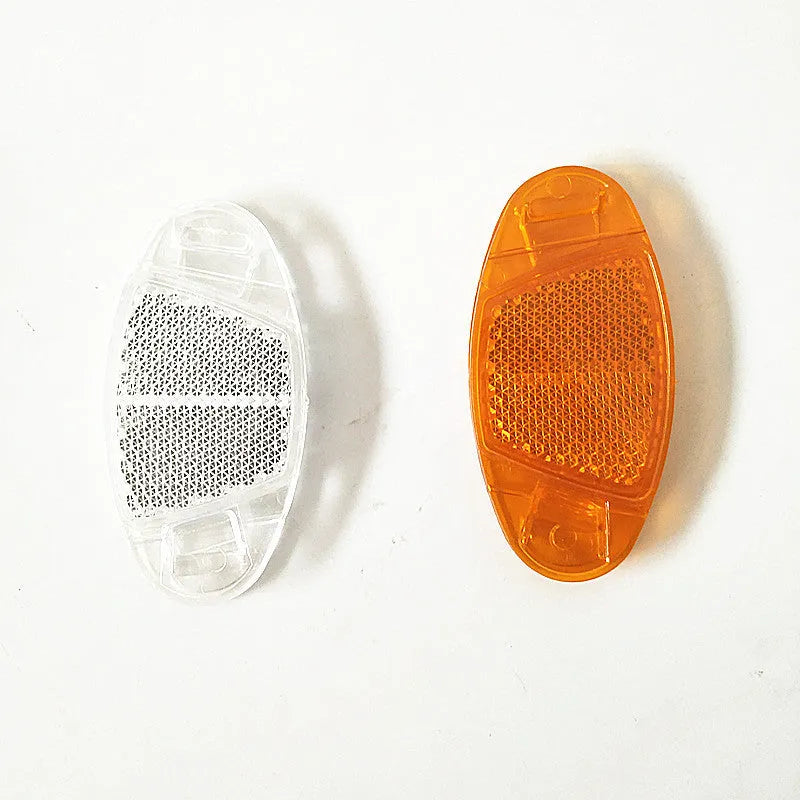 Yellow and white plastic bicycle spoke reflectors measuring 7.2cm for night safety