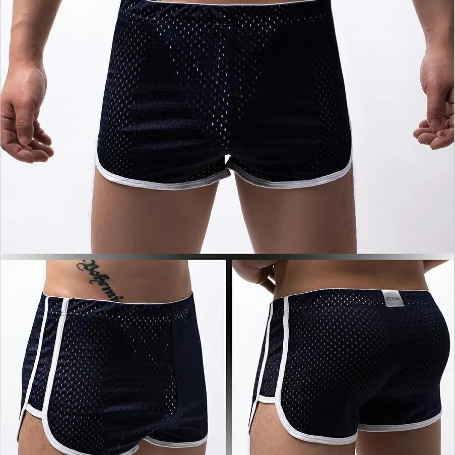 A pair of men's three-point boxer shorts in a cotton-nylon blend on a neutral background.