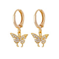 Copper butterfly earrings with irregular geometric design combining heart, bow and star shapes in diamond colour treatment