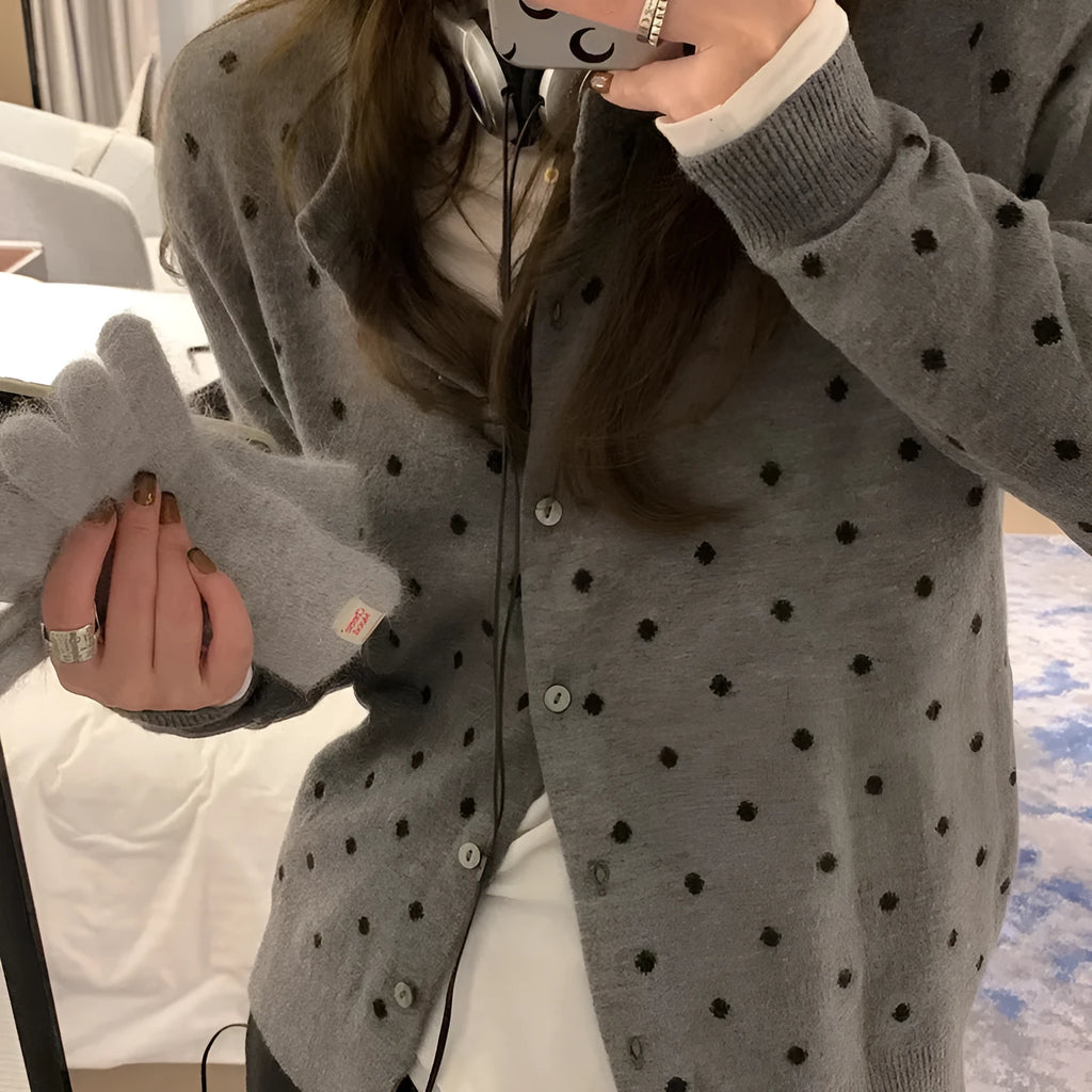 Women's grey knitted cardigan with crochet flower details, loose fit, long sleeves