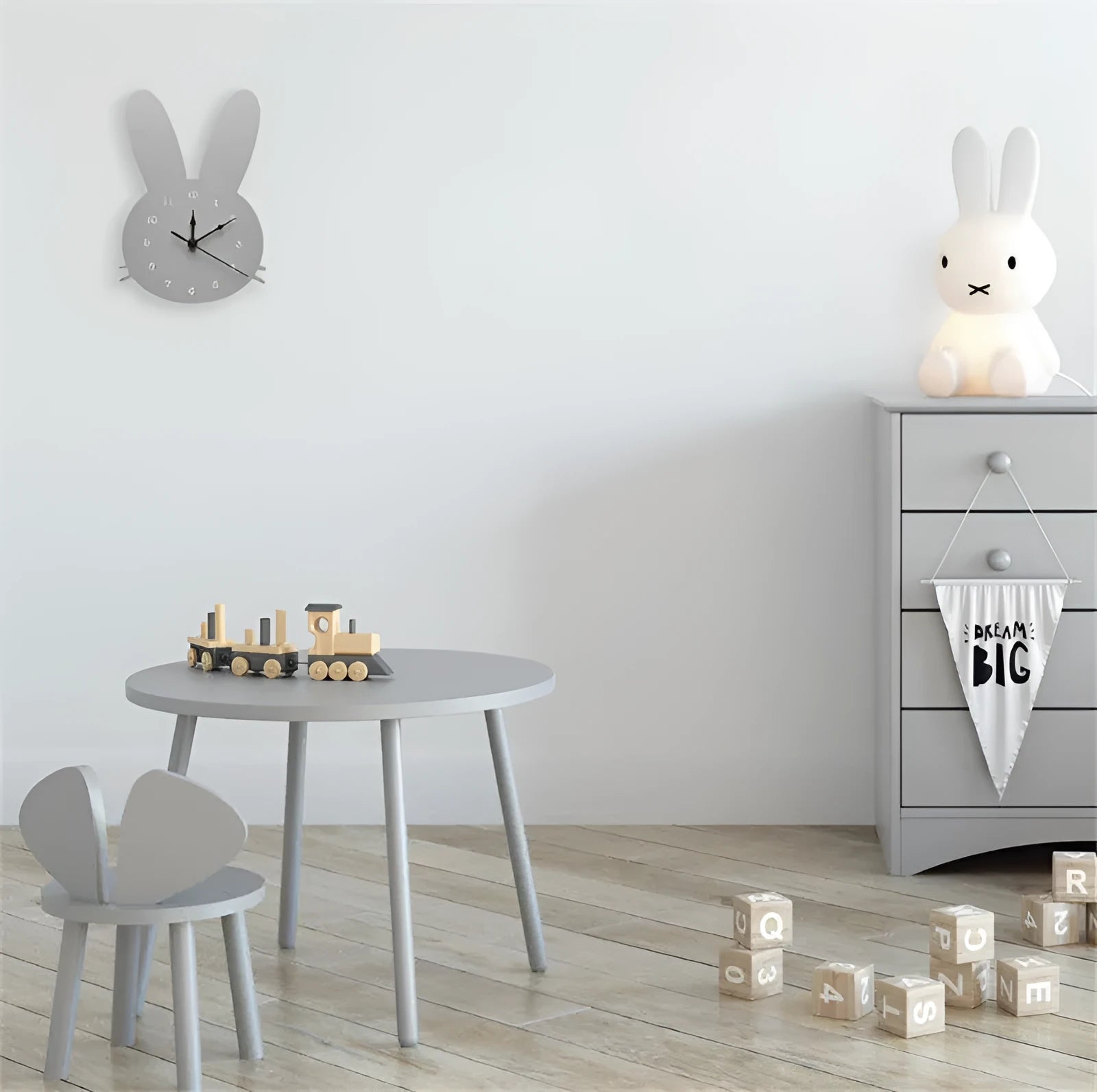 Wooden cartoon wall clock with playful design, such as a rabbit or alien, showing colour options and battery compartment.