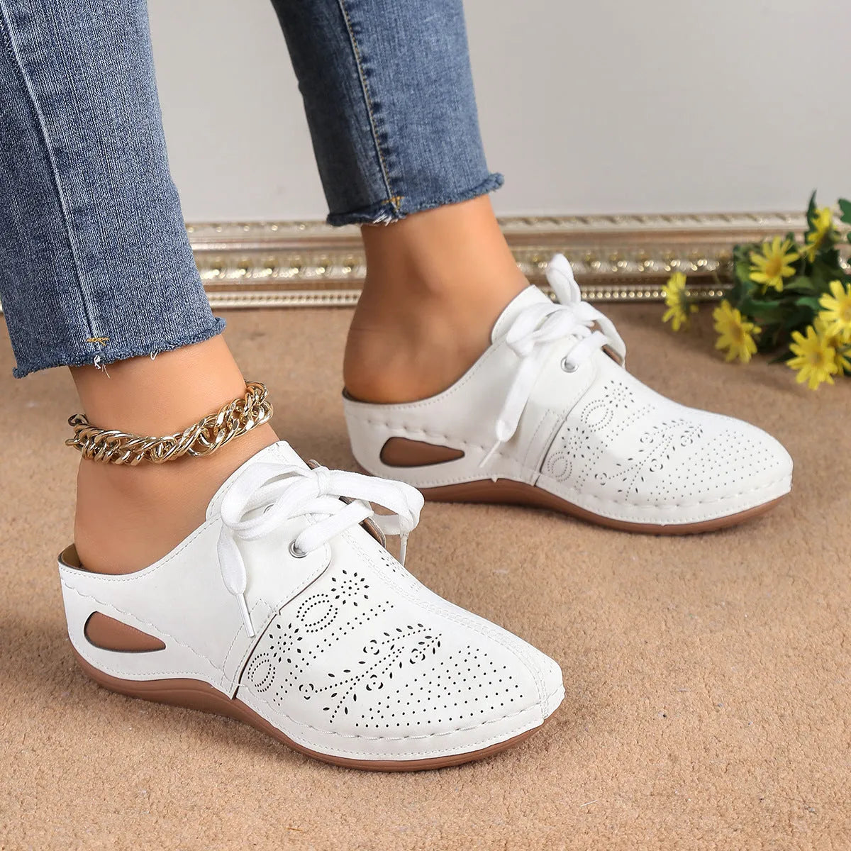 Women's light grey suede lace-up wedge slippers with a hollow-out rubber sole.