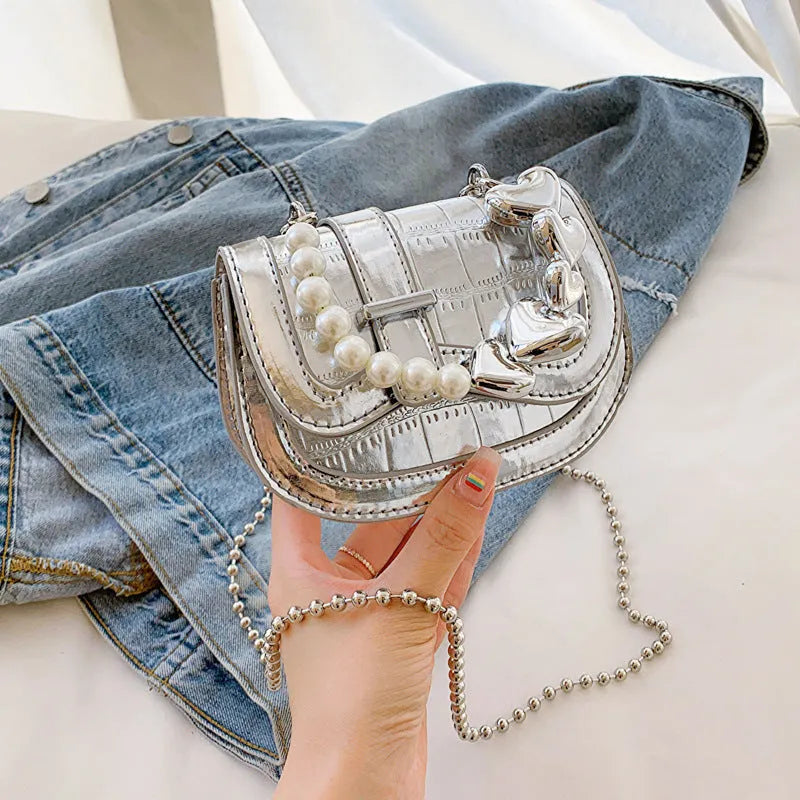 Women's PU leather mini tote crossbody bag showing mobile phone compartment and sandwich pocket