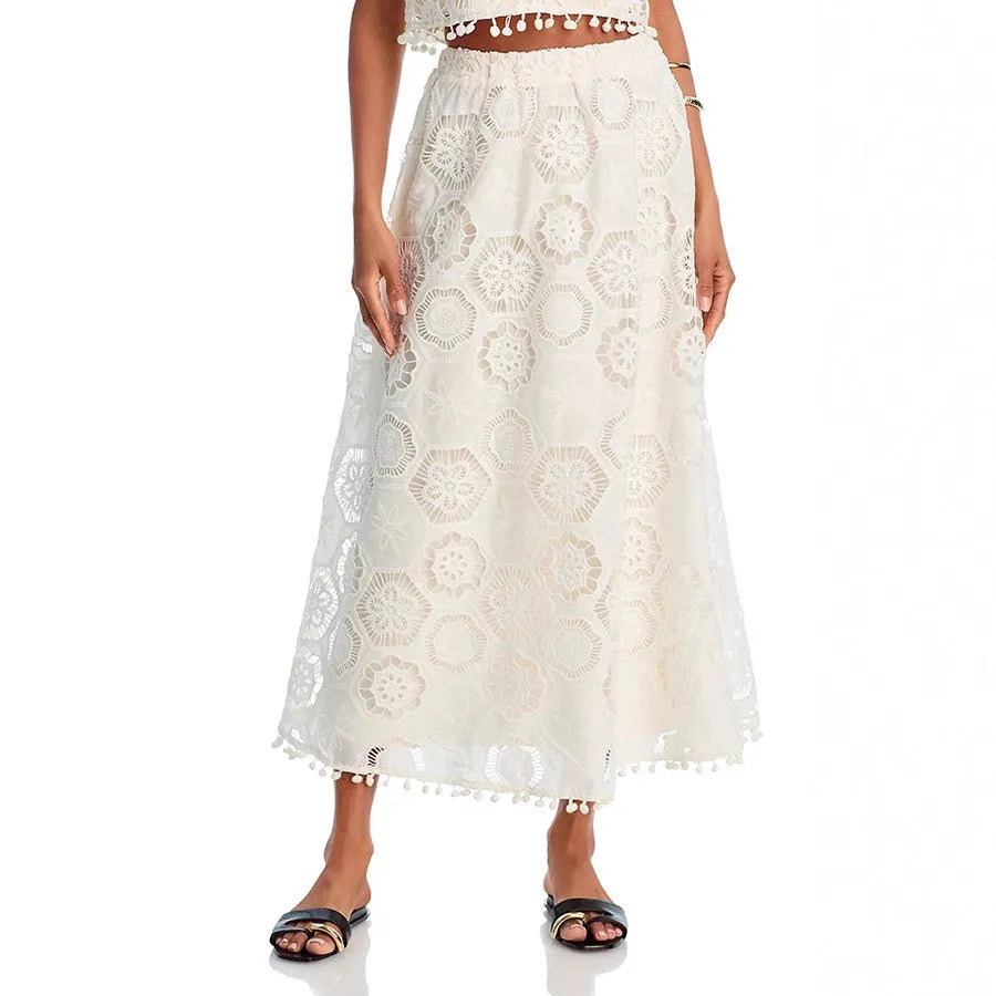 White women's retro style suit set with embroidery, featuring a sleeveless top and a long skirt.
