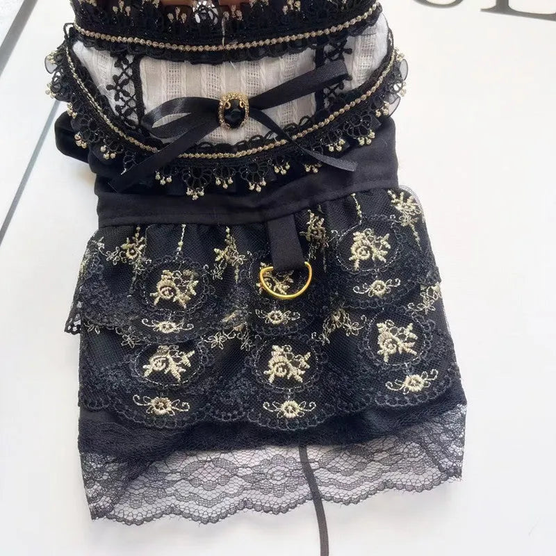 Golden Gothic princess-style skirt dress for a small dog or cat on a mannequin.