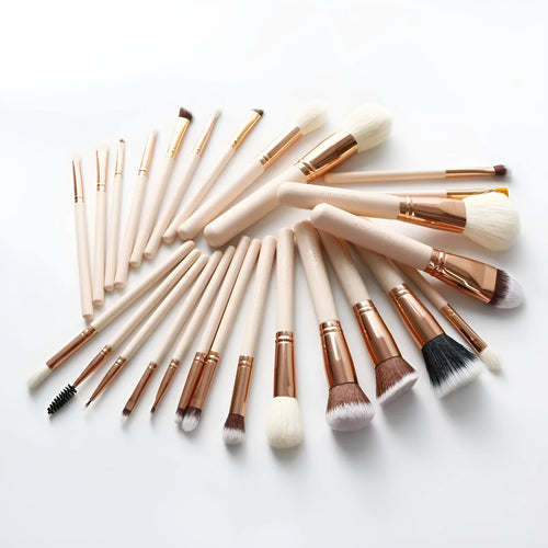 26 pink makeup brushes with wooden handles displayed in a open pink PU travel case