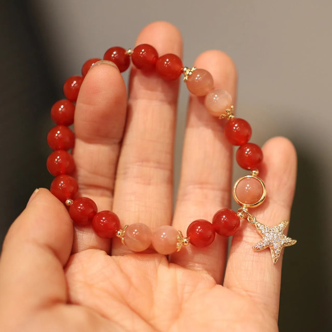 Handmade 8mm red agate star-shaped bracelet for women, ethnic style with Xiangyun design, sands orange finish