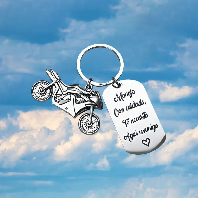 Stainless steel inspirational motorcycle keychain with metal ring and flannel storage bag.