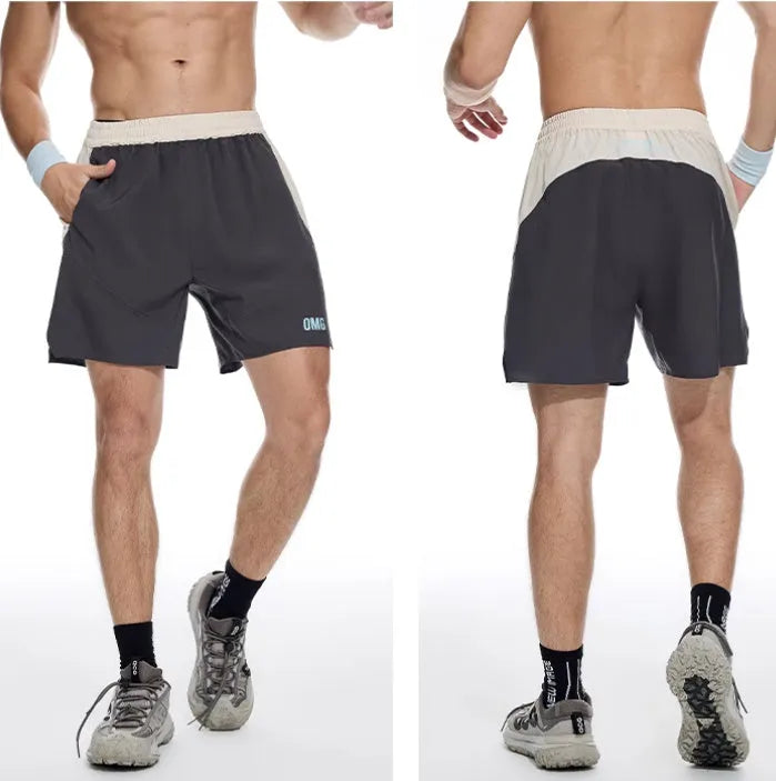 Men's grey workout shorts with elastic waistband and lace-up fly for gym training sessions