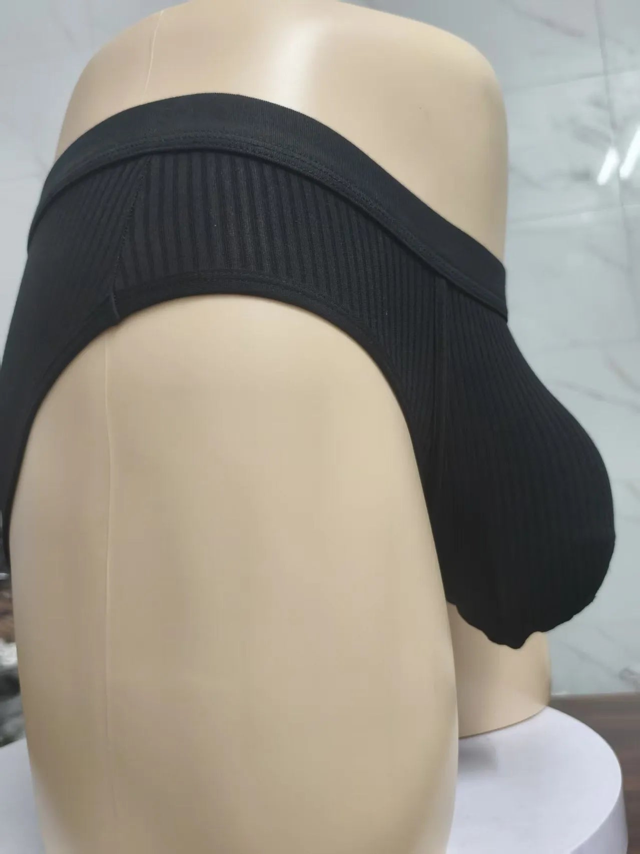 Men's triangle breathable knitted viscose U-shaped big bag underwear in solid colour shown on model