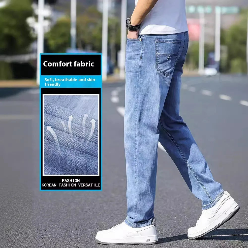 Thin stretch cotton denim trousers in black, tapered business casual style with belt loops and front pockets