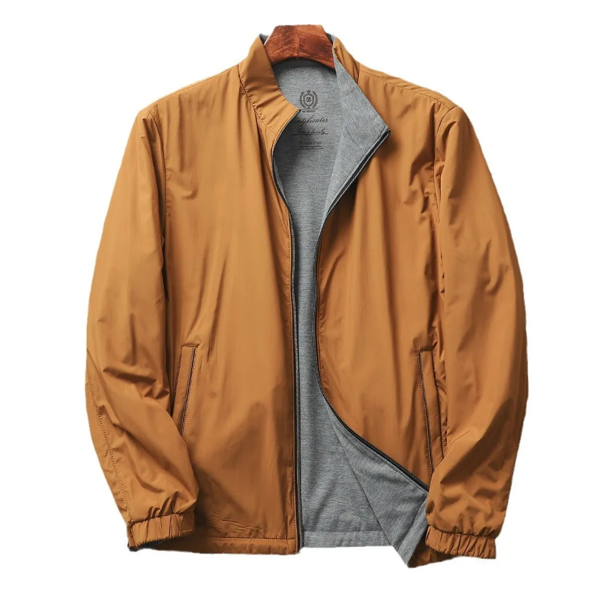 Men's stand collar casual jacket in blue, shown on a model.