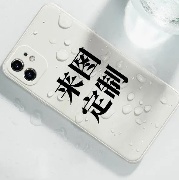 Customised acrylic couple phone case in transparent finish for iPhone showing a personal design on silicone rubber body