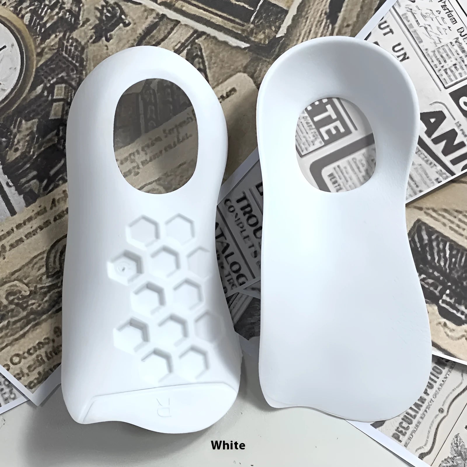TPR arch support insoles for varus correction in white, black and skin colour options