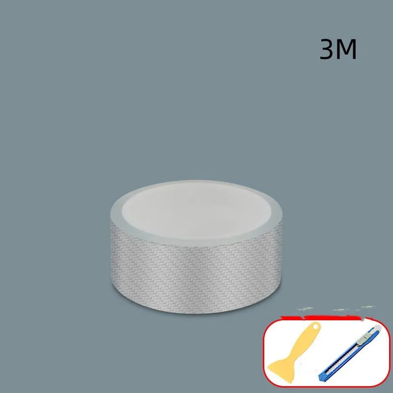 Roll of clear carbon fibre anti-collision film with scraper and utility knife for car door edges