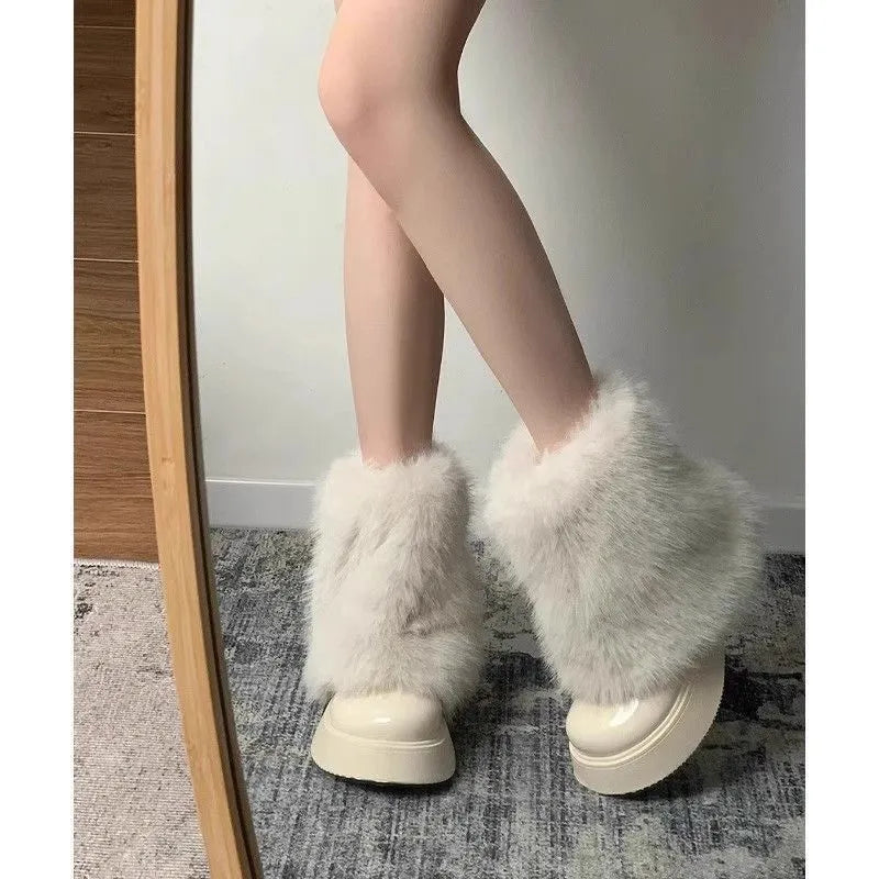 Women's low-top snow boots with artificial plush uppers, waterproof rubber soles, available in black and white colours