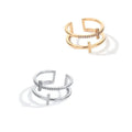 Adjustable copper ring with double cross design, white gold electroplated finish, and zircon gemstones in sterling silver inlays