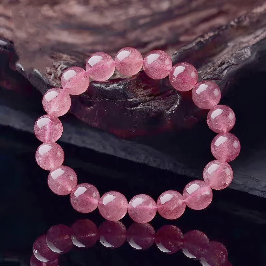 Polished strawberry quartz crystal bracelet for women in 6mm, 8mm and 10mm bead sizes.