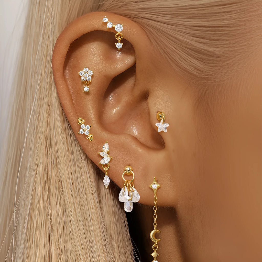 S925 sterling silver geometric earrings with moon and diamond-embedded star design in a gold colour.