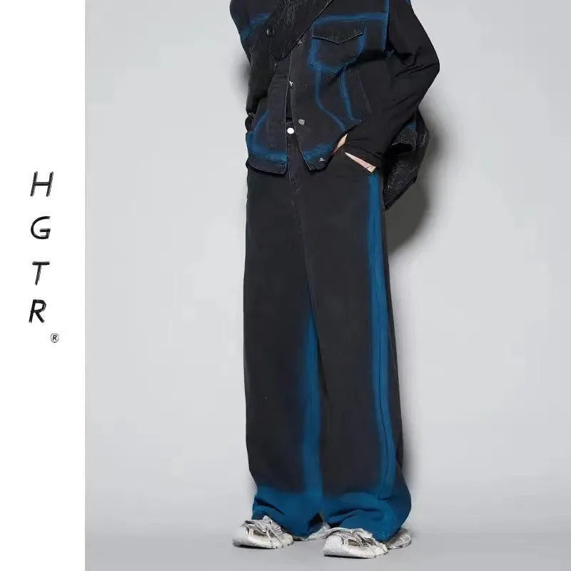 Youth fashion distressed denim suit set showing sleeveless vest and matching jeans with colour gradient finish
