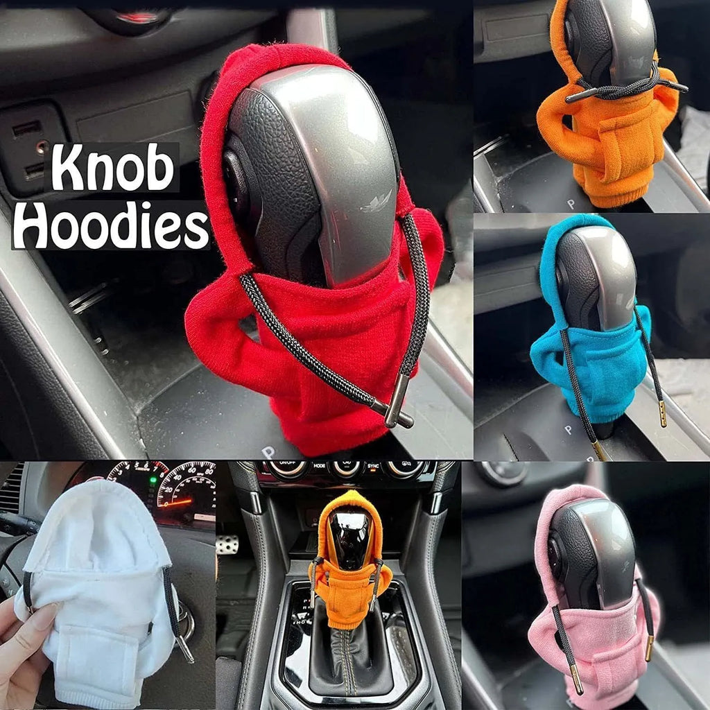 Cloth gear shift knob hoodie cover in various colours on a car gear stick.