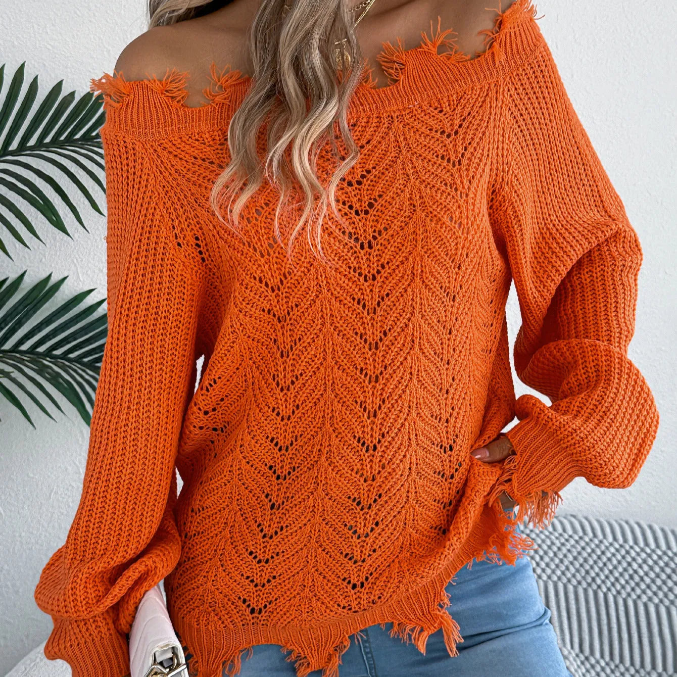 White cut-off-shoulder pullover sweater with hollow-out design and long sleeves