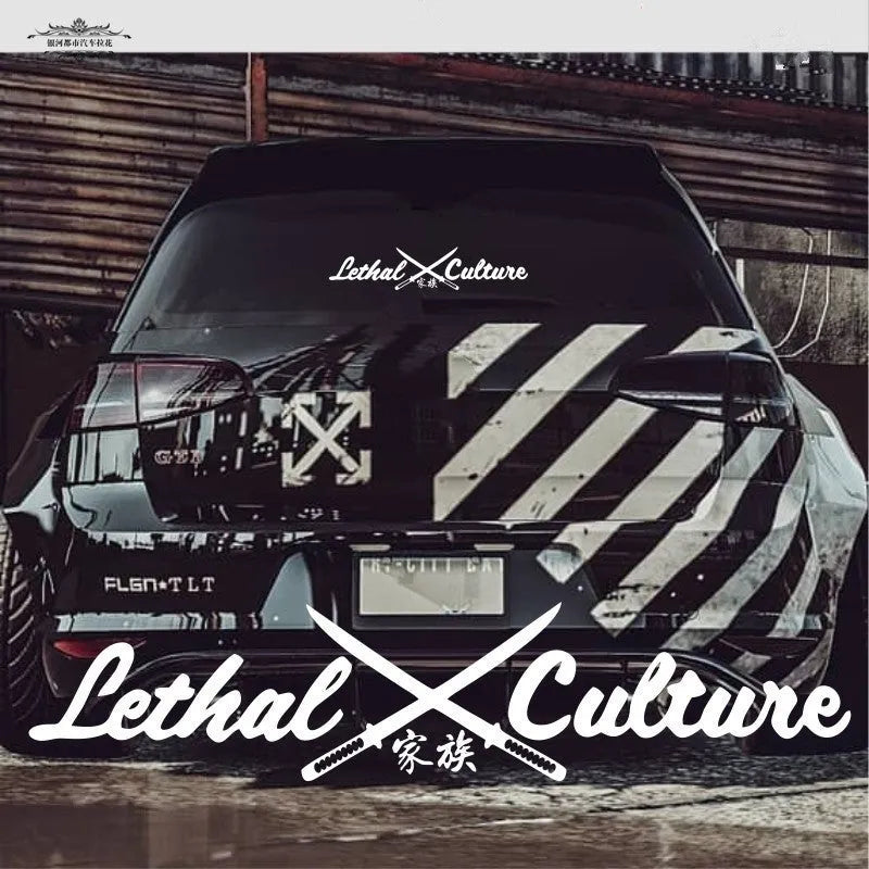 Yellow car rear windshield family sticker with letters and numbers on glass