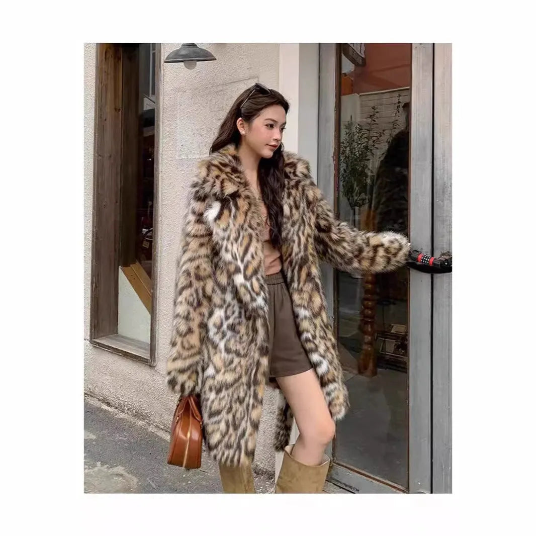 Faux fur coat with fox pattern styling and fur collar in long coat style