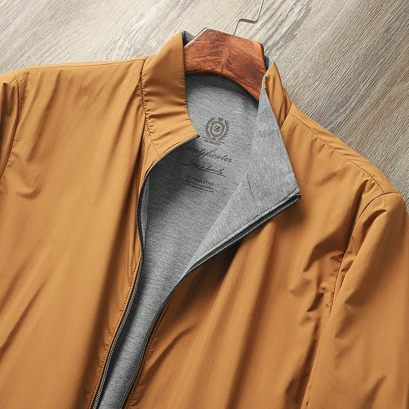 Men's stand collar casual jacket in blue, shown on a model.