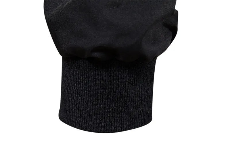 Men's solid colour thin casual jacket in polyester available in dark blue, black, or army green.