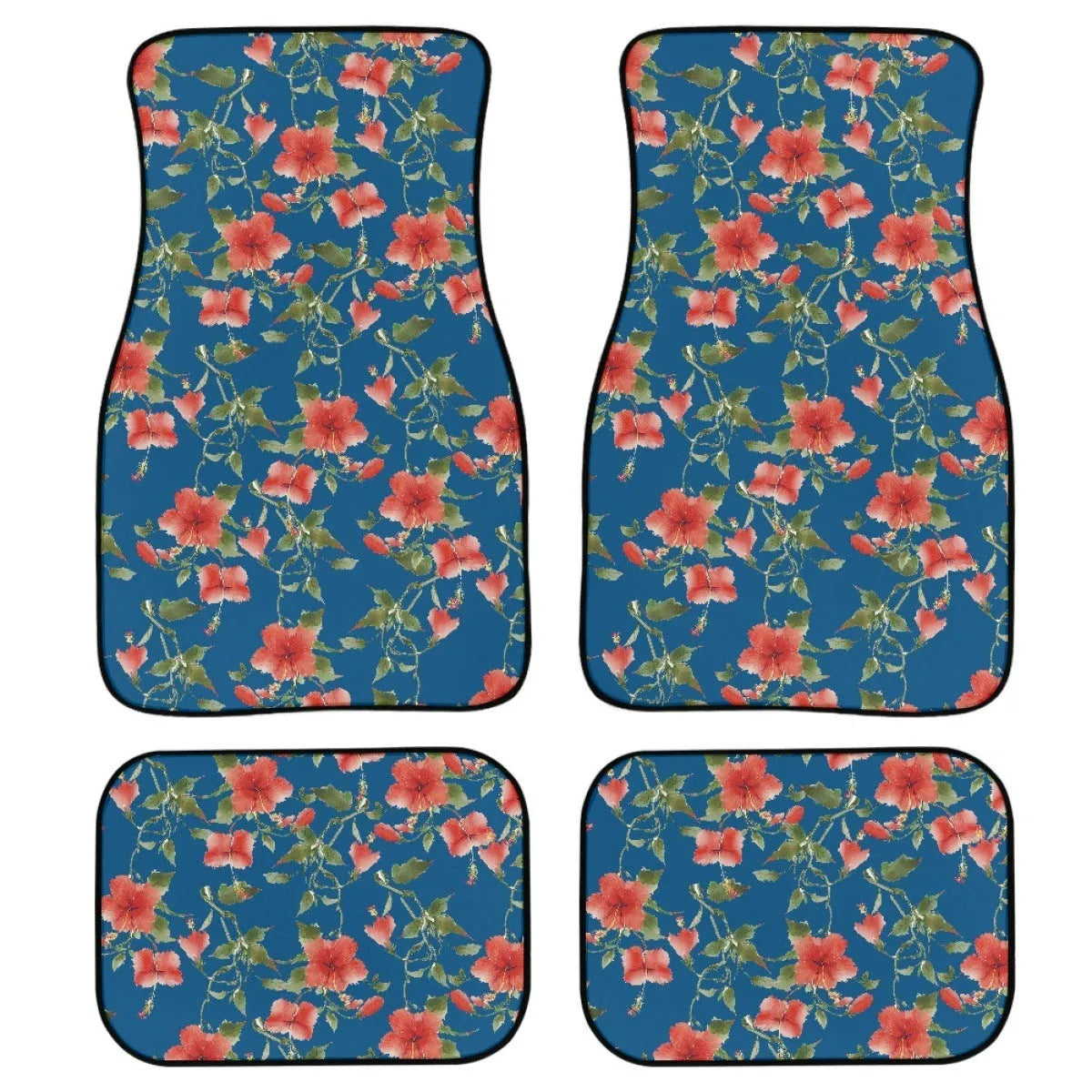 Black four-piece rubber car floor mat set with textured surface, shown fitted in a vehicle footwell.
