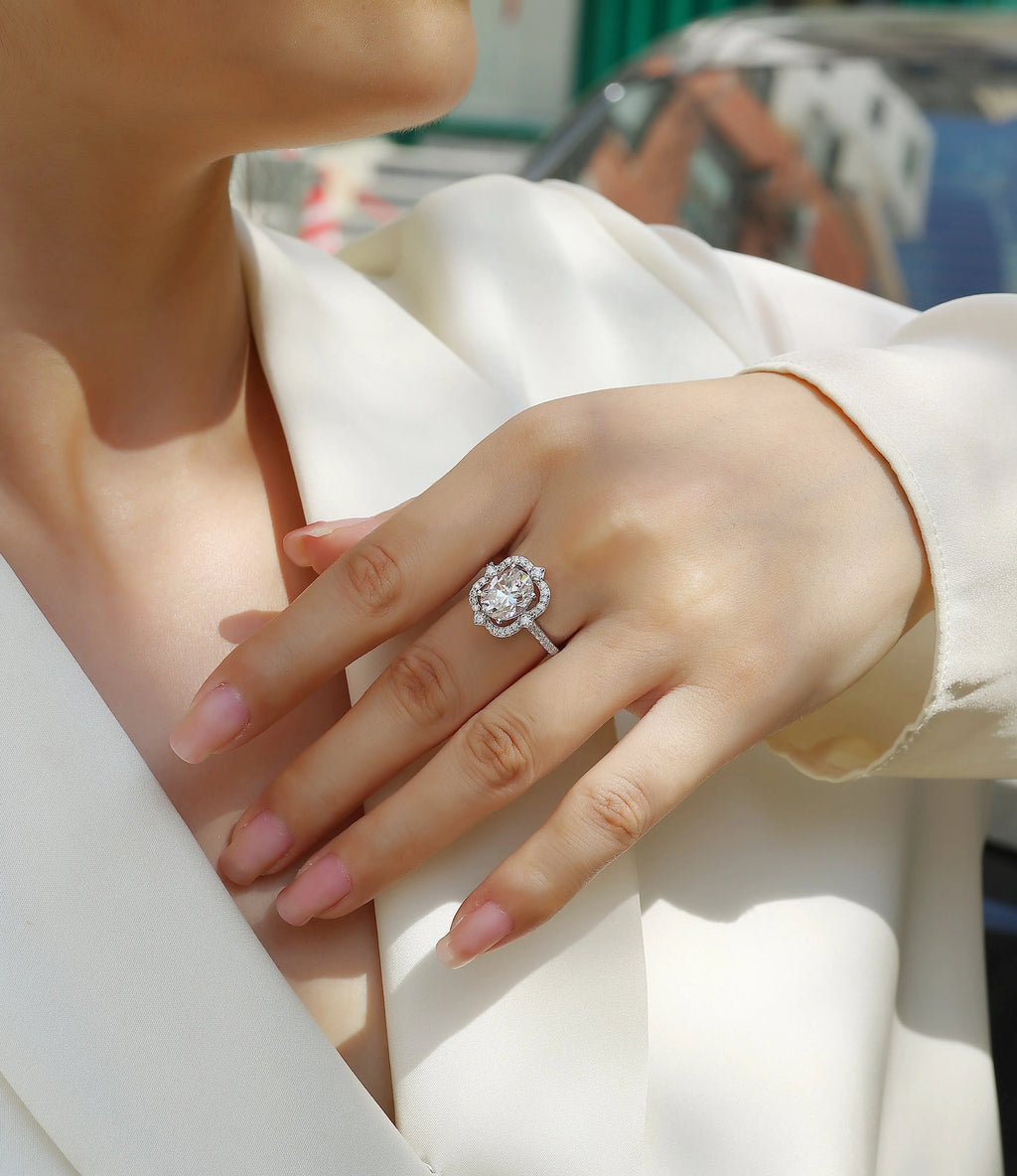 Camellia moissanite wedding ring with egg-shaped 8x10mm stone in S925 silver platinum-plated setting