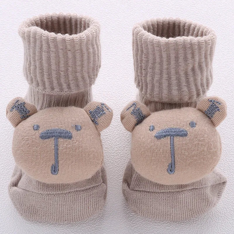 Cotton baby floor socks in multiple patterns including blue bow and lion designs