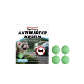 Four anti-marten balls on a light background, each with a solid appearance, featuring quartz sand, peppermint, ginger and lemon ingredients