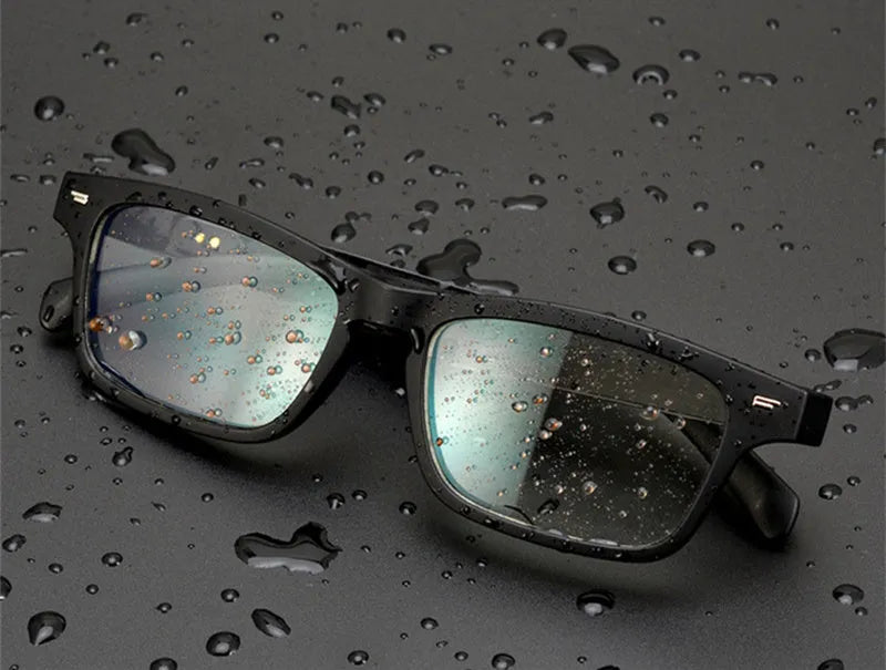 Black smart glasses with Bluetooth audio functionality and polarised lenses for sports and outdoor use