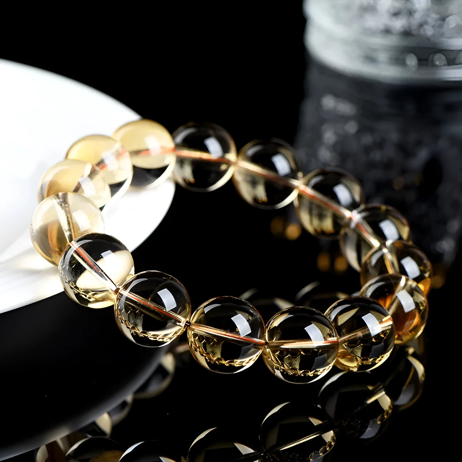 Natural citrine scattered bead bracelet in 7A or 6A grade on a wrist, showing five size options.