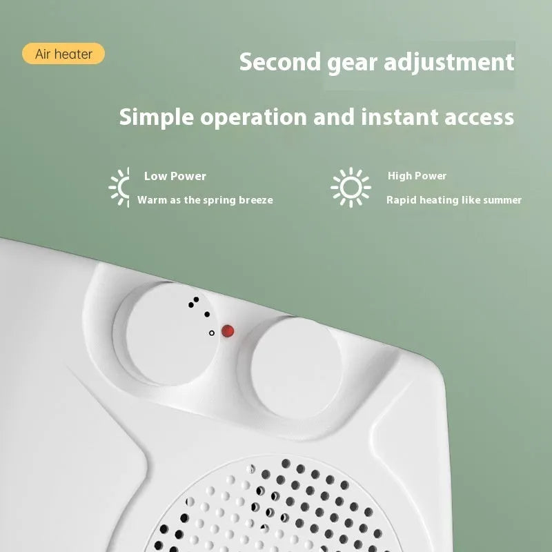 Small white desktop electric warm air blower heater with power controls.