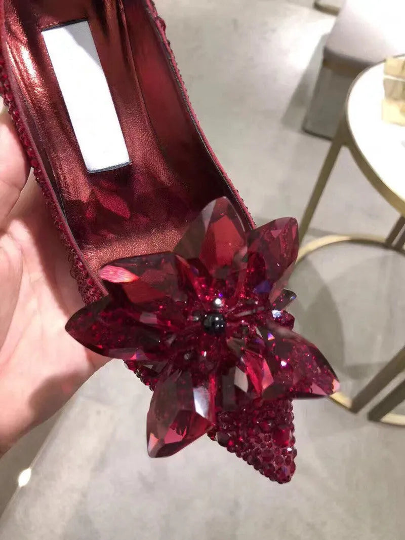 Women's gold pointed toe high heels with rhinestone and bow decoration on sequin cloth