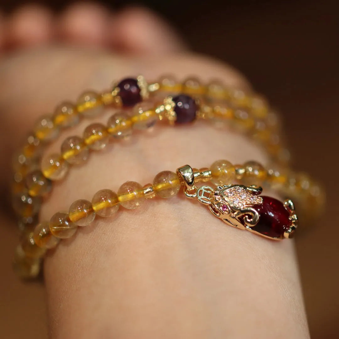 Brazilian rutilated quartz bracelet with three-circle gold chain and Chinese-style design
