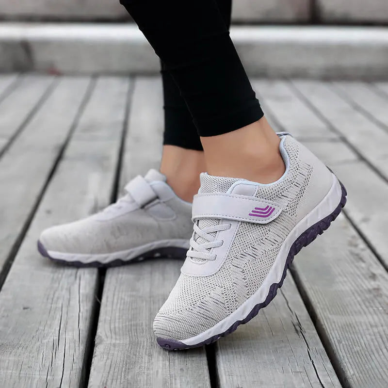 Women's grey purple wedge shoes with mesh upper and velcro closure, showing round toe and soft composite sole.
