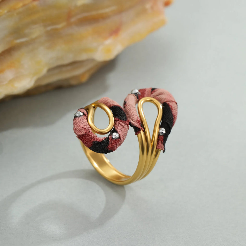 Open mouth stainless steel ring with geometric heart design and leopard print pattern