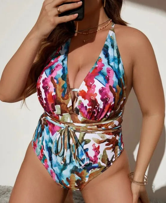 Purple halter neck one-piece swimsuit with European styling on adult female model