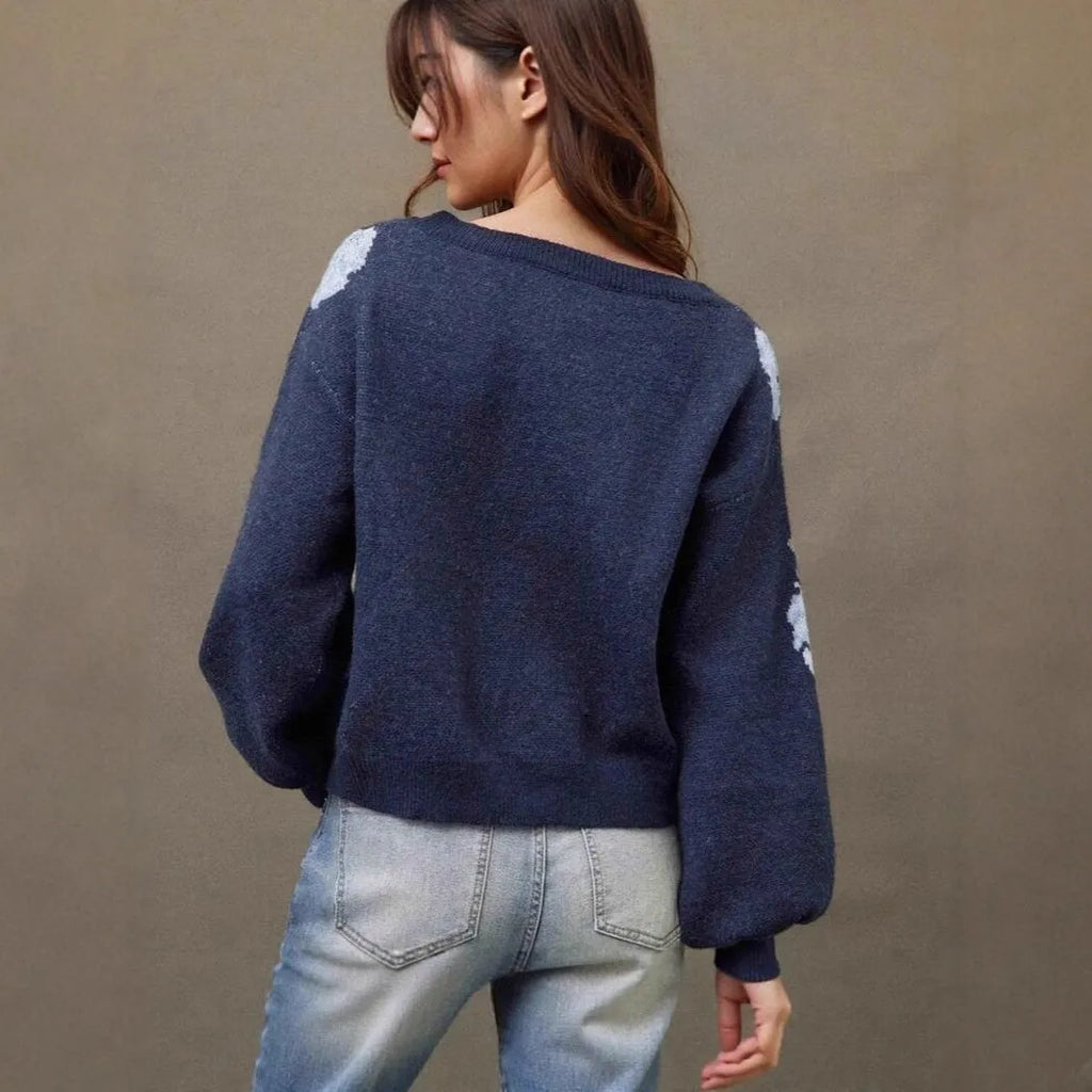Sapphire blue women's loose pullover with all-over floral jacquard pattern, long sleeves.