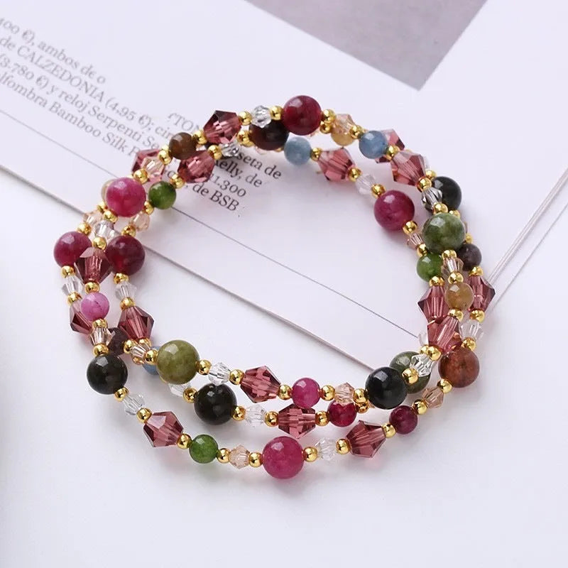 Women's adjustable three-ring crystal bracelet with tourmaline, strawberry quartz and amethyst stones