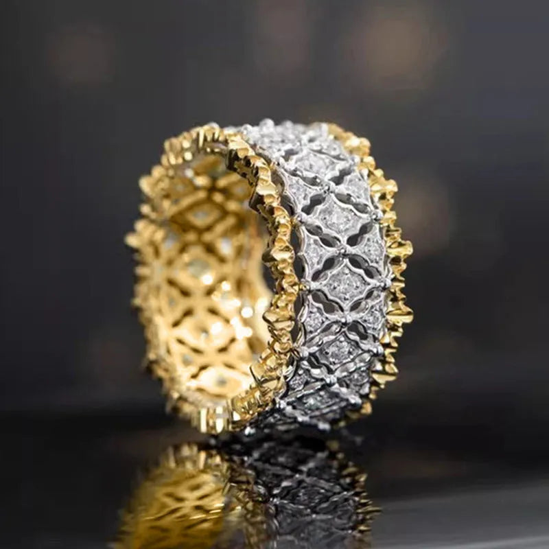 Geometric two-tone gold zircon ring with round elements on copper base