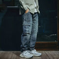 Men's blue loose straight leg jeans with retro styling and zip fly opening